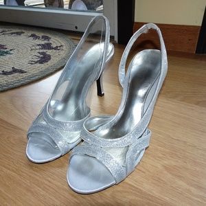 Silver high heel shoes - size 8.5